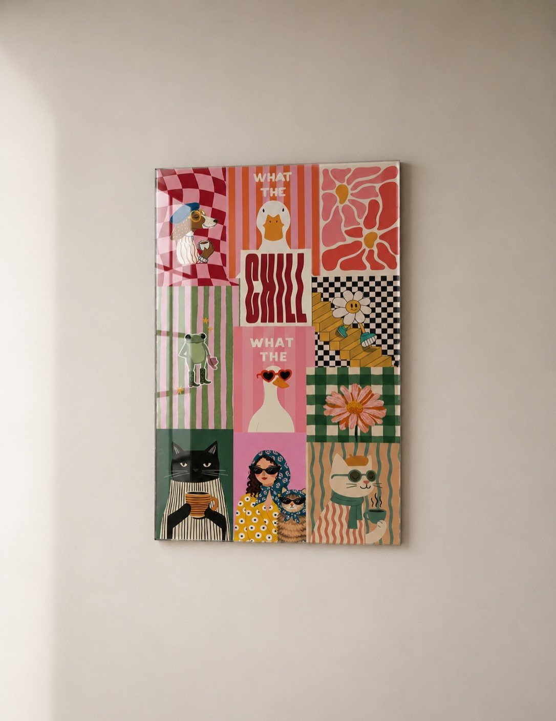 Colorful collage wall art with whimsical animal illustrations and checkered patterns hanging on a wall.