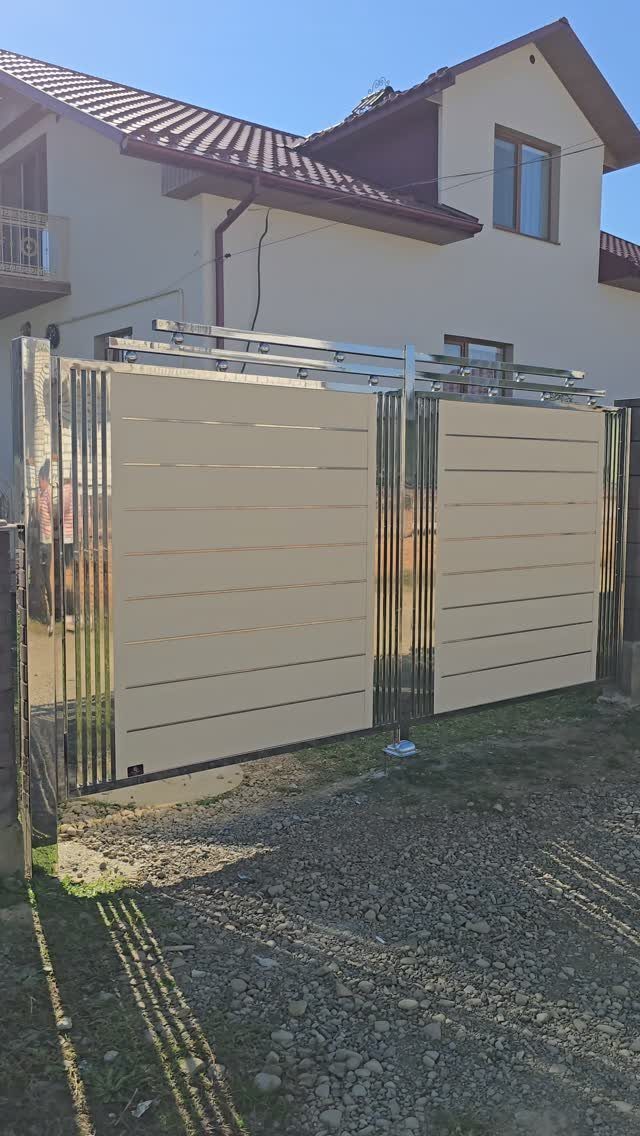 Fence Grill Design Modern: 28 Ideas from Steel to Aluminum 24 Modern metal fence with beige horizontal panels and polished chrome frames before a house.