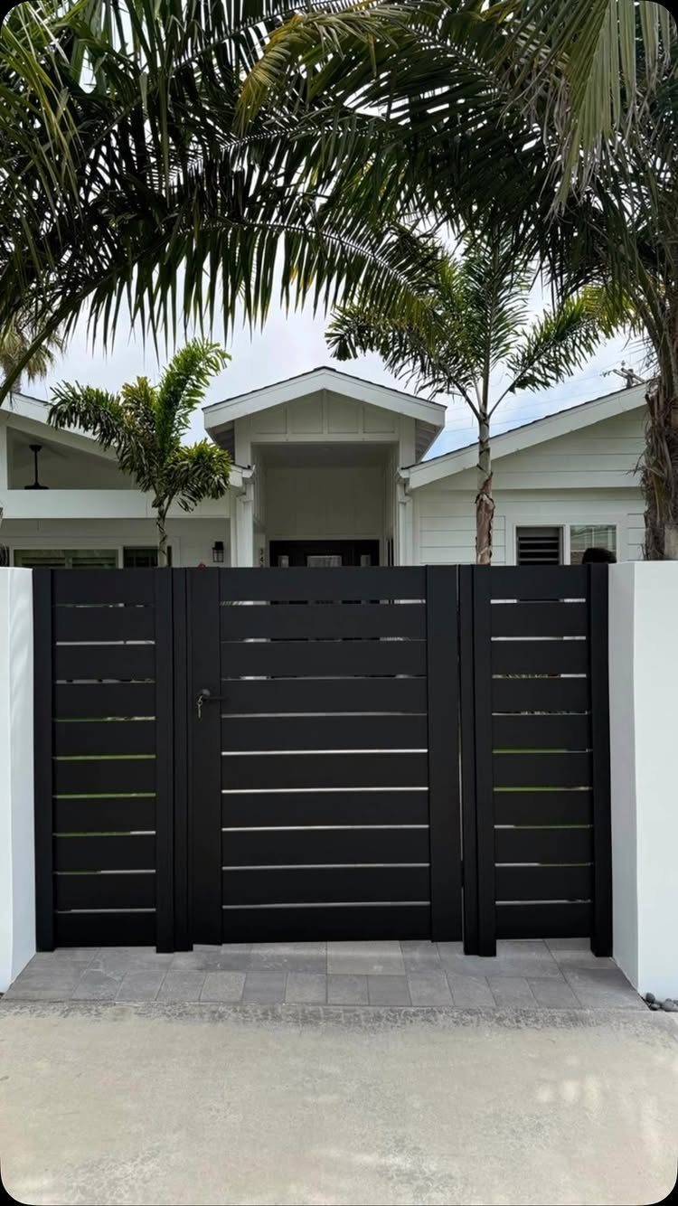 Fence Grill Design Modern: 28 Ideas from Steel to Aluminum 8 Black horizontal slat metal fence and gate in front of a white house