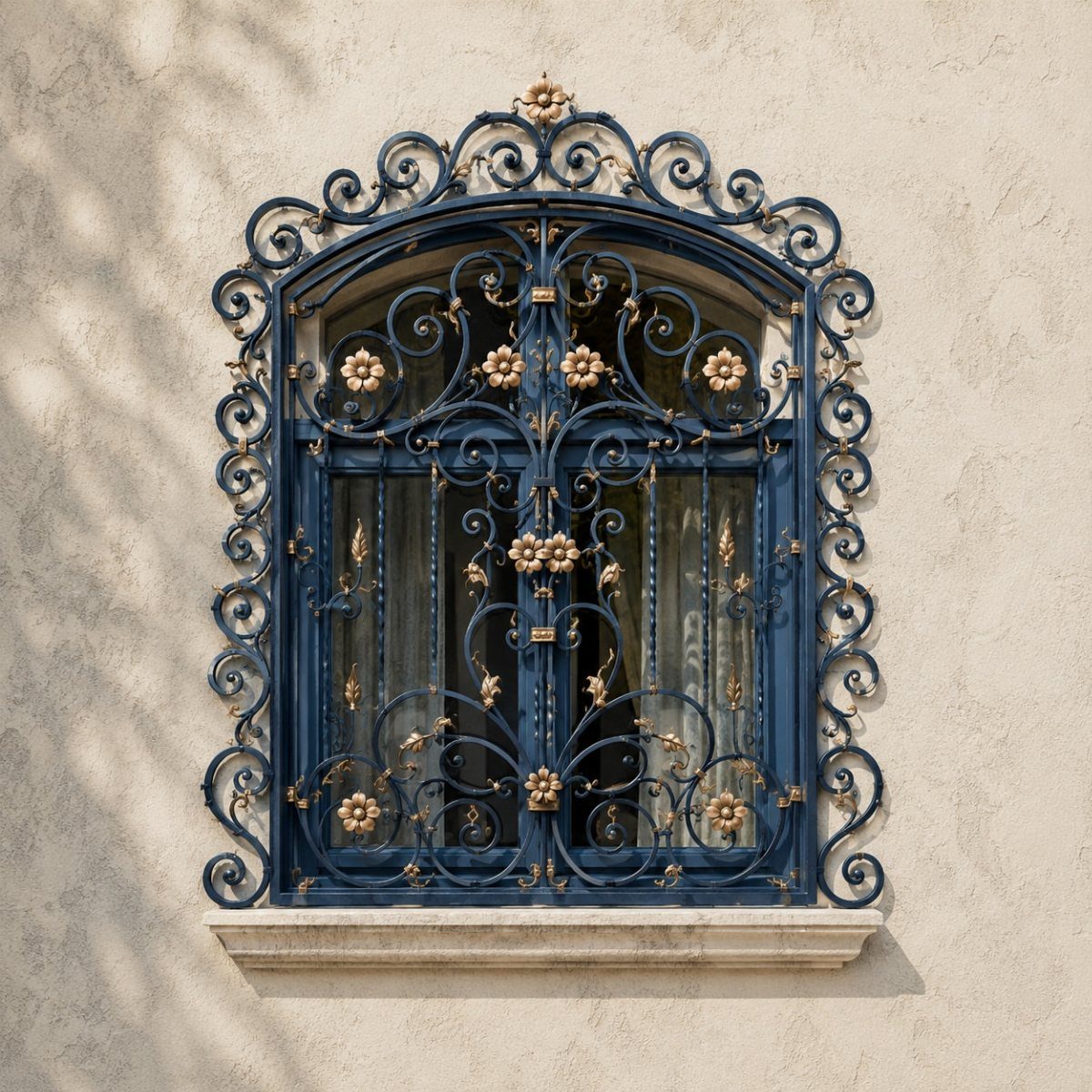Ornate dark blue wrought iron window grill with gold floral accents and swirls.