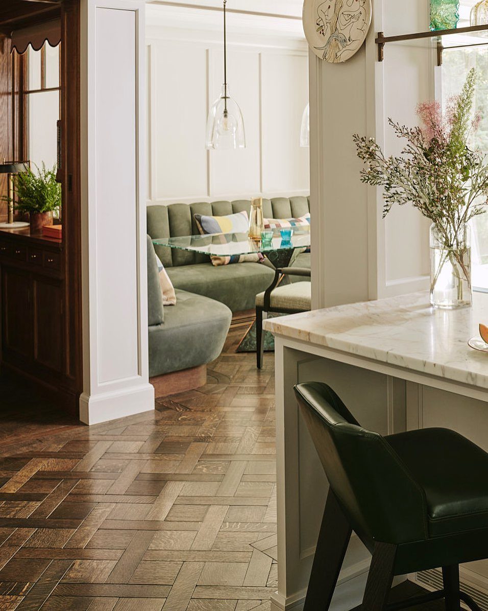 Parquet Floor Pattern: 8 Historic Layouts That Still Define Interiors 8 Wooden parquet floor with a basketweave pattern in a bright, modern dining room setting.