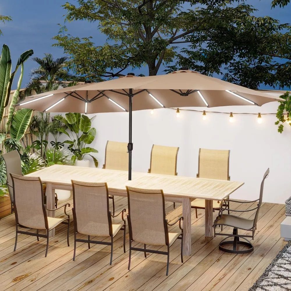 25 Patio Lights Ideas, From String Lights to Step Lighting 18 Tan patio umbrella with built-in LED lights over a wooden outdoor dining set.