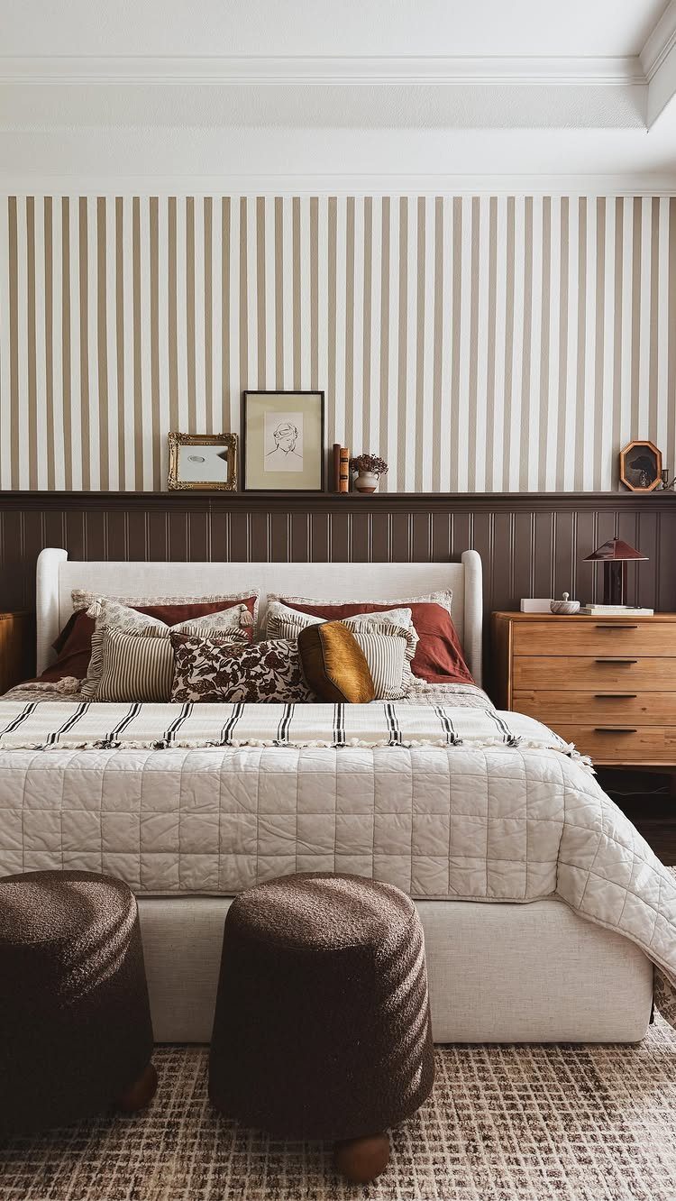 9 Wall Paneling Accent Wall Ideas for Every Room 5 Dark brown beadboard wainscoting on a bedroom wall behind a white upholstered bed.