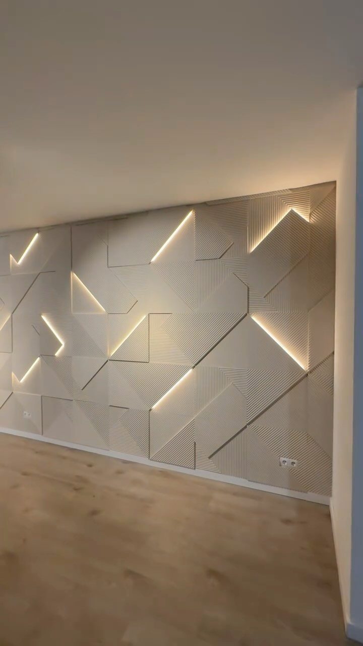 Geometric wooden wall planks with integrated LED lighting strips in a modern room setting.