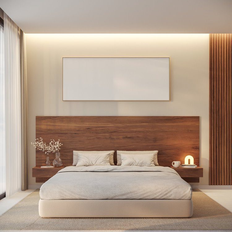 A large wooden panel headboard behind a bed with white linens in a modern bedroom.